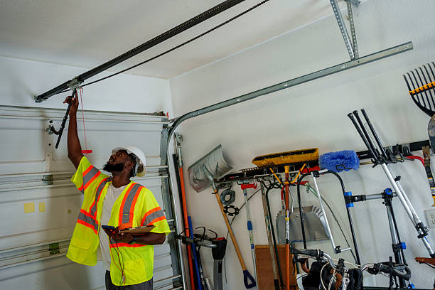 Professional Garage Door Installation technician working in Rogers, TX